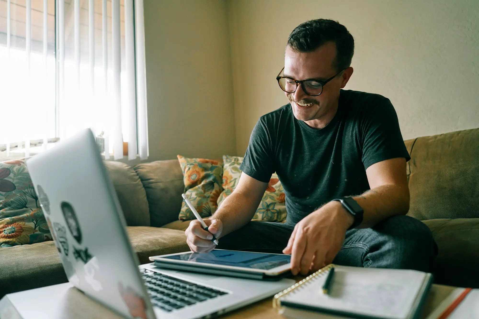 Business owner working on a laptop from the lounge