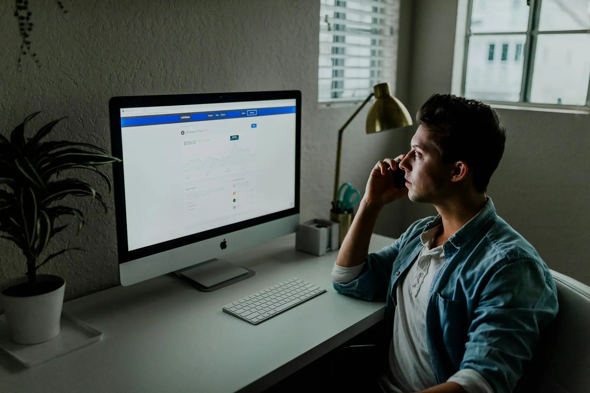 Business owner on the phone at his desk